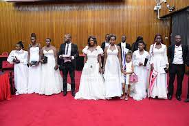WOMAN TURNS UP FOR EALA NOMINATION IN BRIDAL GOWN, ENTOURAGE